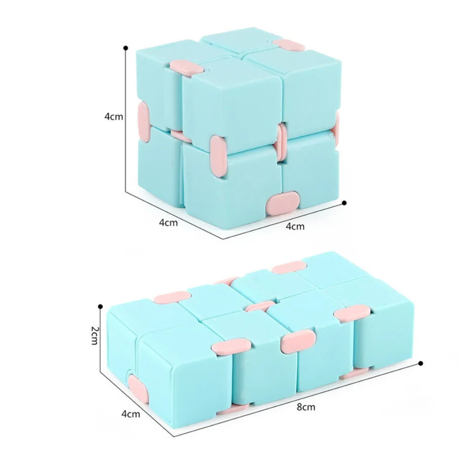 A set of light blue infinity magic cubes used as a fidget toy for stress relief.