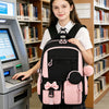 A smiling girl wearing a school uniform and carrying a pink backpack with a laptop compartment.