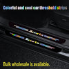 Colorful and cool car threshold strips with sports lettering installed on a car door sill.