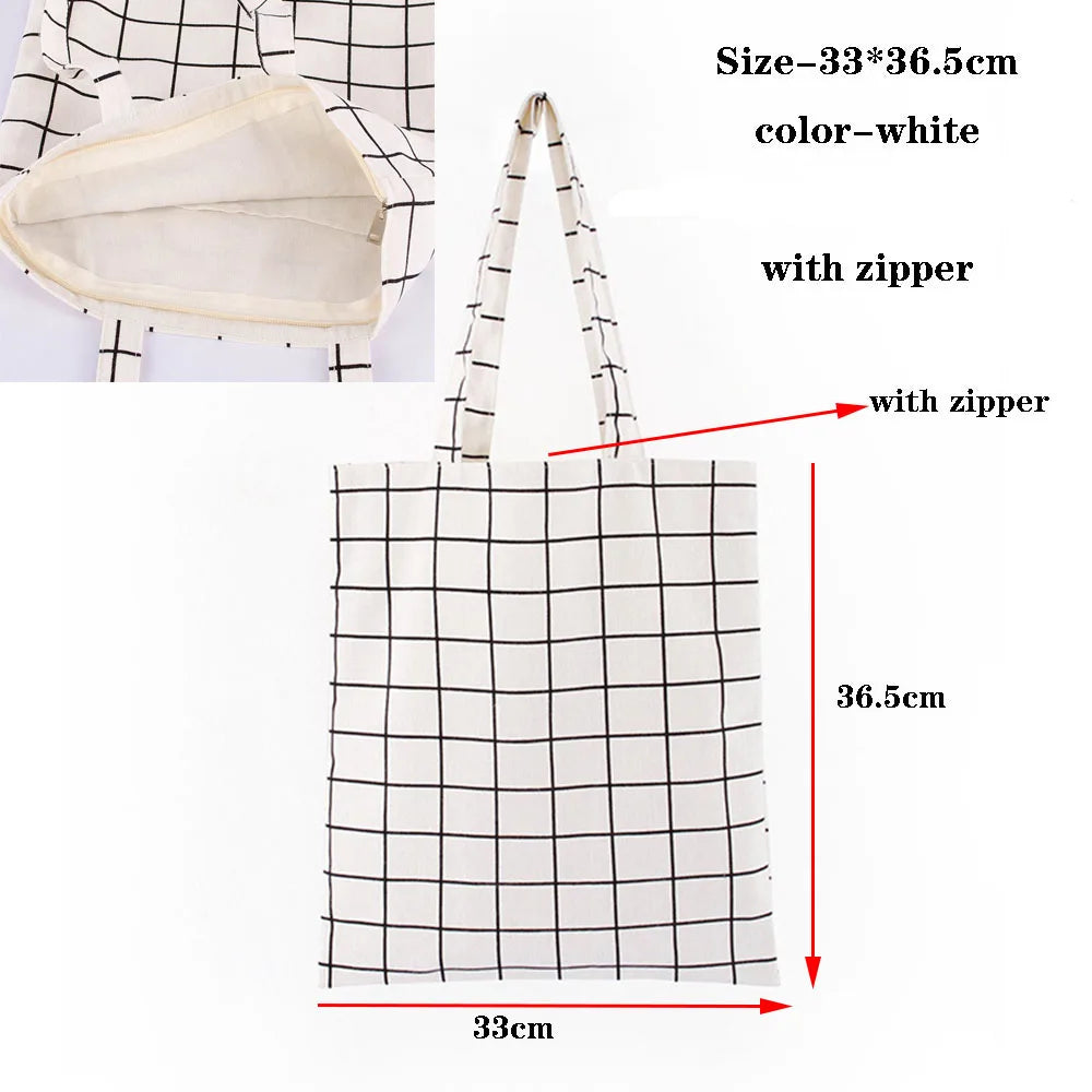 White checkered canvas tote bag with zipper and handles, shown flat.