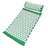 A green acupressure mat and pillow set with white dots for pain relief and relaxation.