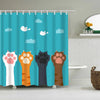 A shower curtain featuring cute cartoon paw prints and clouds for pets