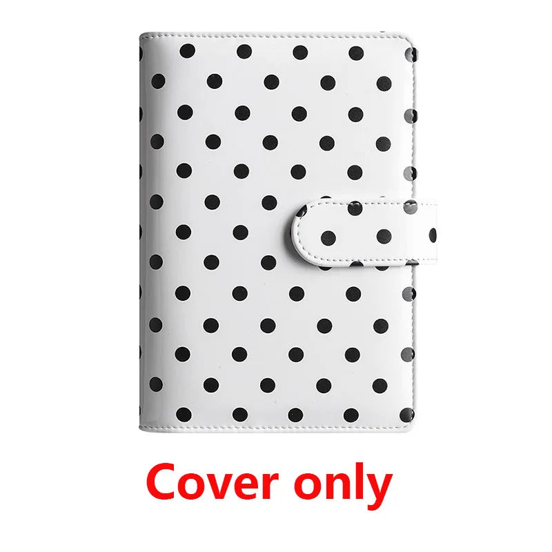 White PU leather binder wallet with black polka dots and a protective flap.