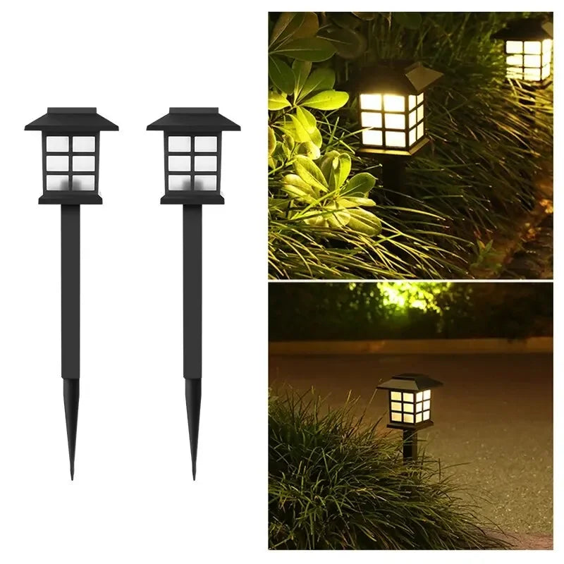 Un jeu de deux lumières solaires noires éclairant un jardin ou un chemin la nuit.