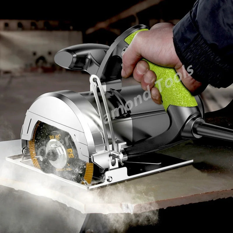A hand is operating a silver turbo diamond saw blade on a piece of tile or stone.