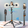 Palo selfie de seguimiento de 360 grados montado en trípode con luces LED dual y pantalla de smartphone.