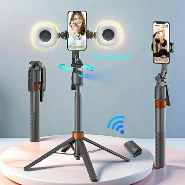 A tripod-mounted 360 degree tracking selfie stick with dual LED lights and a smartphone display.
