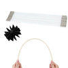 A flexible chimney and dryer vent cleaning brush kit showing a long white brush and a curved white cleaning tool being held.
