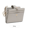 A light grey RFID shielded women's bi-fold credit card wallet with a gold chain detail.
