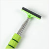 A bright lime green retractable car mirror and window cleaning wiper with a silver handle.