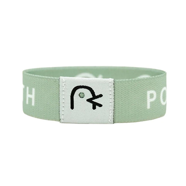 Bracelet Bible avec symbole stylisé sur fond carré blanc.