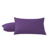 A pair of solid purple microfiber pillowcases with envelope closure.