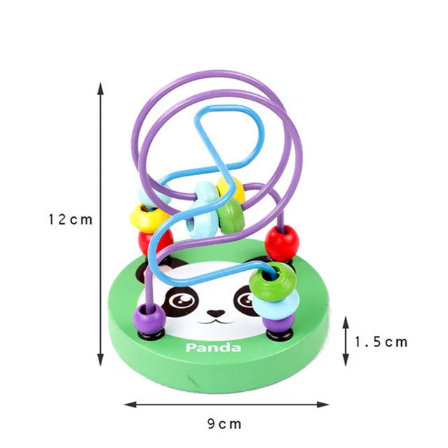 A green wooden puzzle board shaped like a panda with purple, blue, and yellow rings.