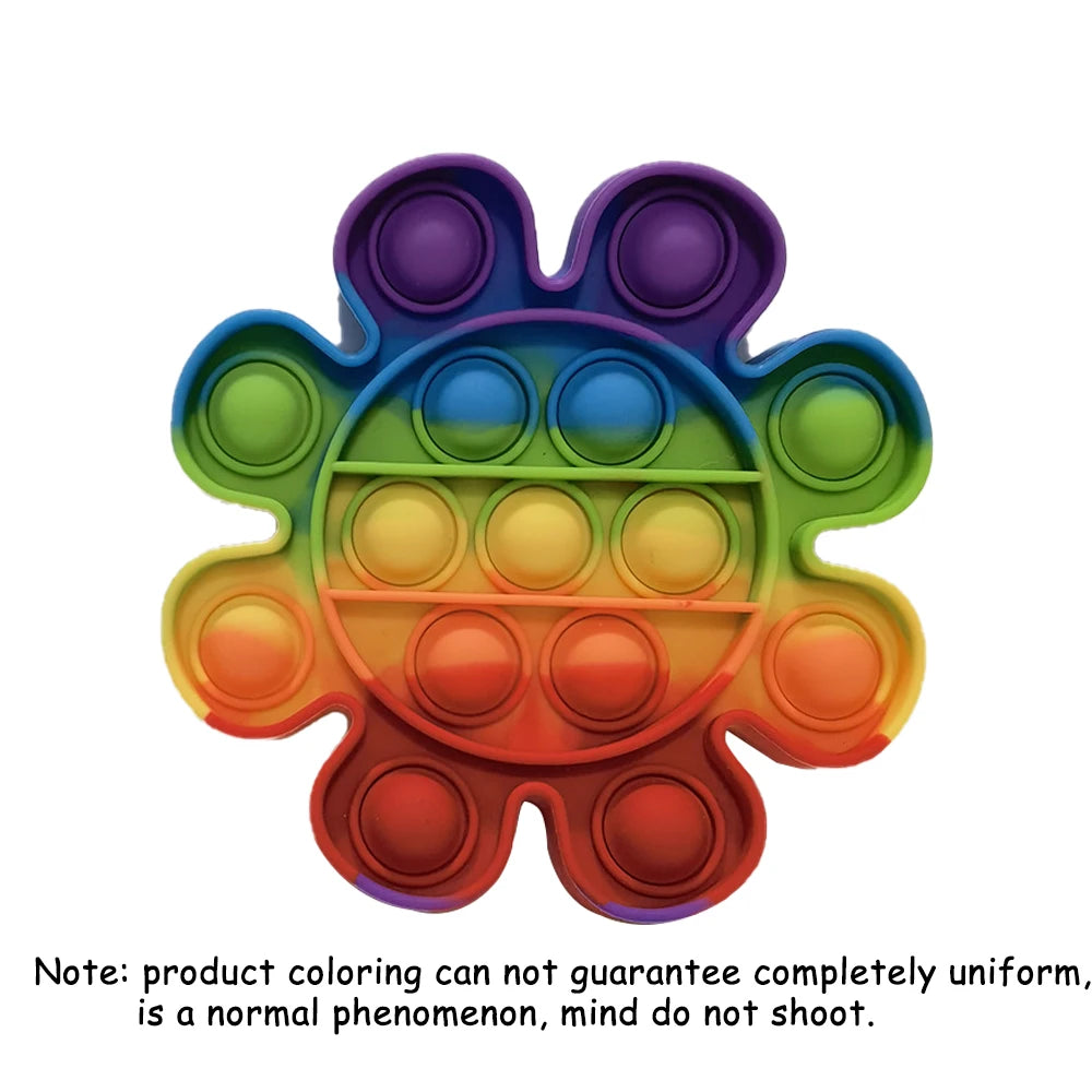 A colorful pop-it fidget board shaped like a sun, featuring multiple colored silicone bubbles.
