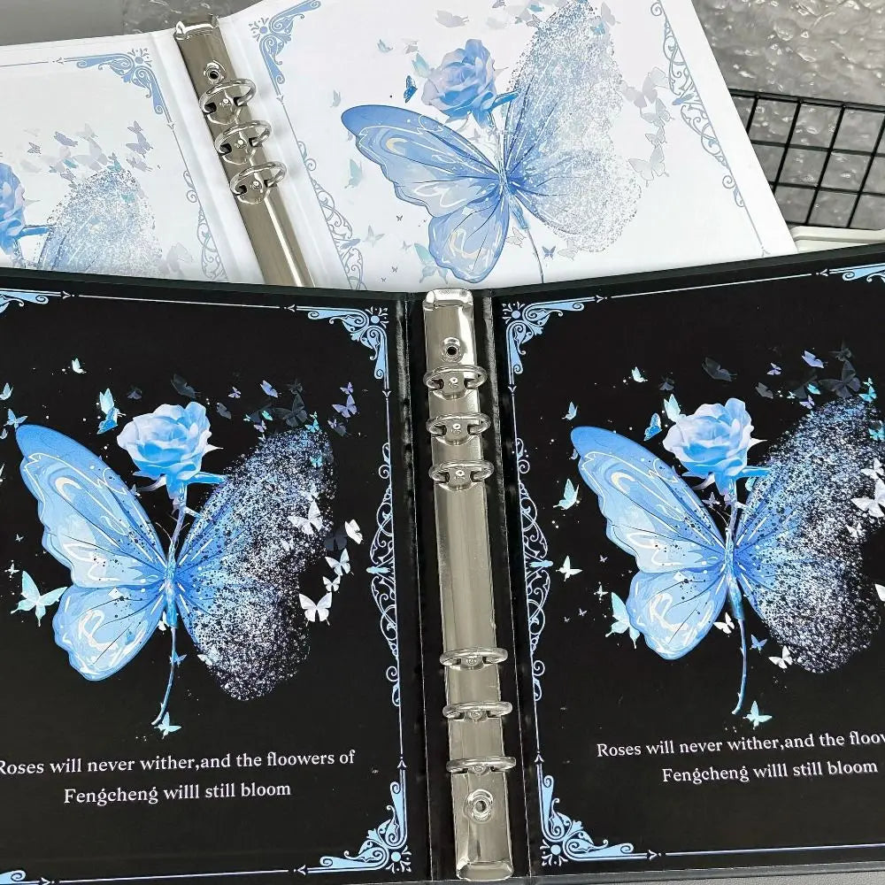 A photo album featuring butterfly designs on the cover pages, with a silver binding.
