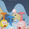 Three cute cartoon modeling toys in pink, blue, and yellow colors with balloon-powered racing cars