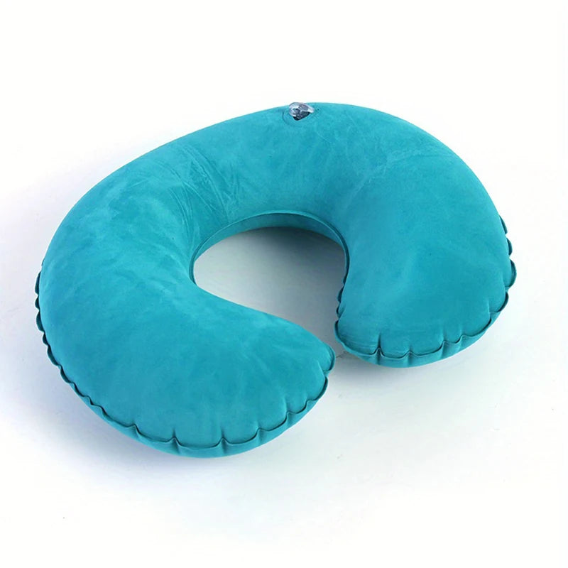 A teal inflatable U-shaped travel neck pillow with a silver clip.