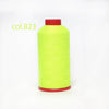 A spool of bright lime green heavy-duty nylon bonded thread with a red cap.