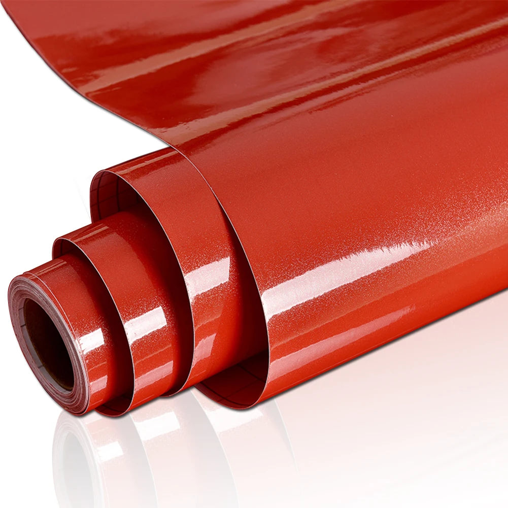 Roll of waterproof self-adhesive marble wallpaper in a glossy reddish-orange color rolled up