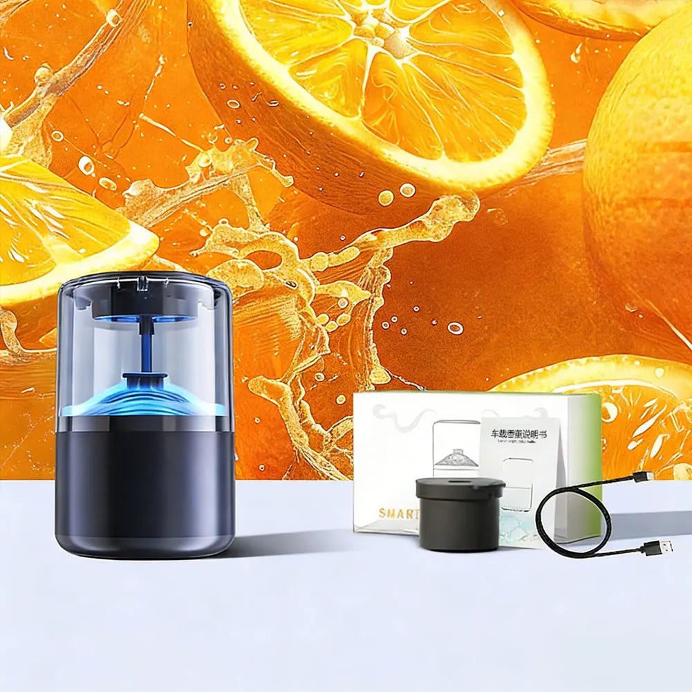 A black smart car diffuser with ambient light and auto mist is shown next to its packaging and an orange background.