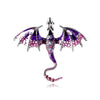 A detailed enamel dragon brooch featuring purple and pink iridescent scales and rhinestone accents.