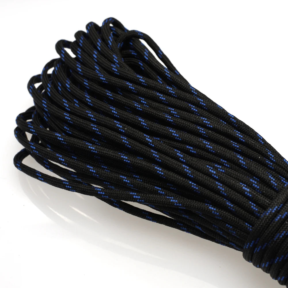 A bundle of black paracord rope with blue markings is shown diagonally.