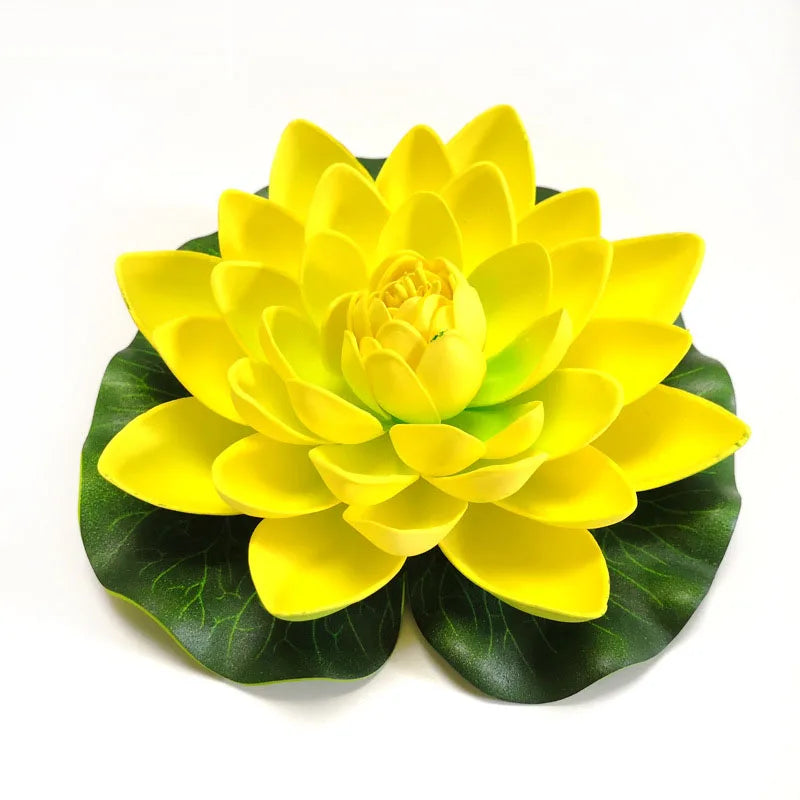 A vibrant yellow lotus flower with green leaves, designed for pond and garden decor.