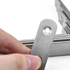 A hand is holding a stainless steel 90-degree angle bracket, showing its design and mounting hole.
