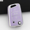 A purple TPU car key cover for VW, SEAT & Skoda models with various buttons and a silver ring.