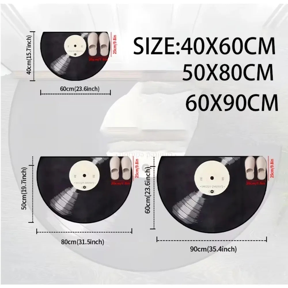 A black half-round doormat with a circular design showing various sizes and dimensions.