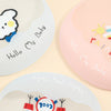 A collection of soft silicone baby bibs featuring cute cartoon animal prints and text like Hello My Baby.