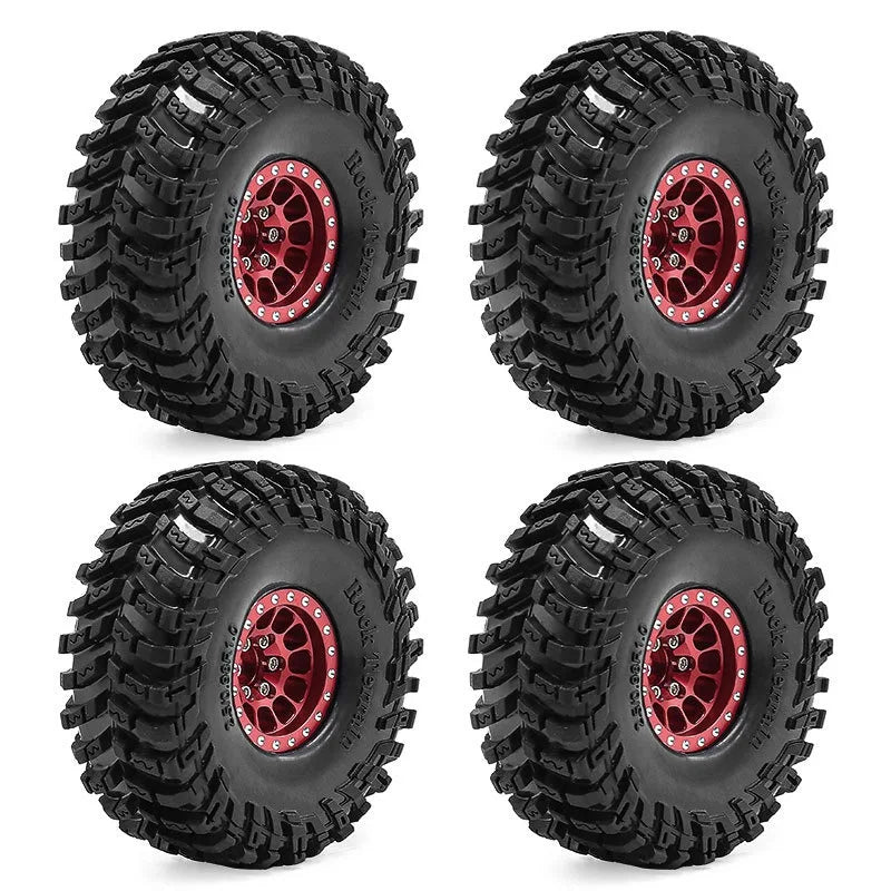 Set of four black metal beadlock RC crawler wheels with tires