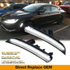 Smoked LED side marker lights for a Chrysler 200 vehicle.