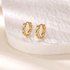 Boucles d'oreilles créoles en zircon cubique ton or