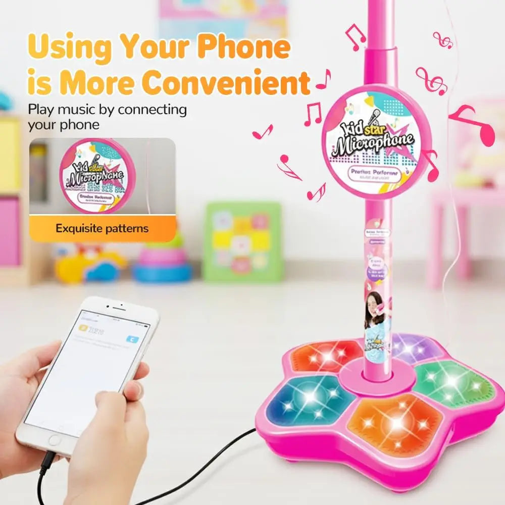 A pink microphone stand with a colorful base and light-up features, demonstrating how to play music using a phone.