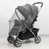 A black universal mosquito net cover for a baby stroller or crib with a handle and wheels.