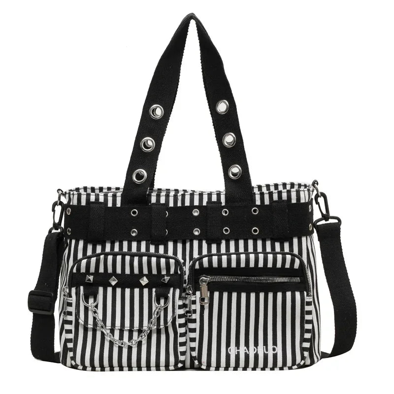 Black and white striped nylon shoulder bag with silver chain accents