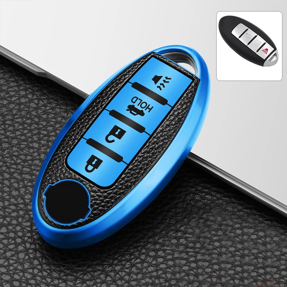 A blue TPU key fob cover with a black protective case and various buttons shown on a dark surface.