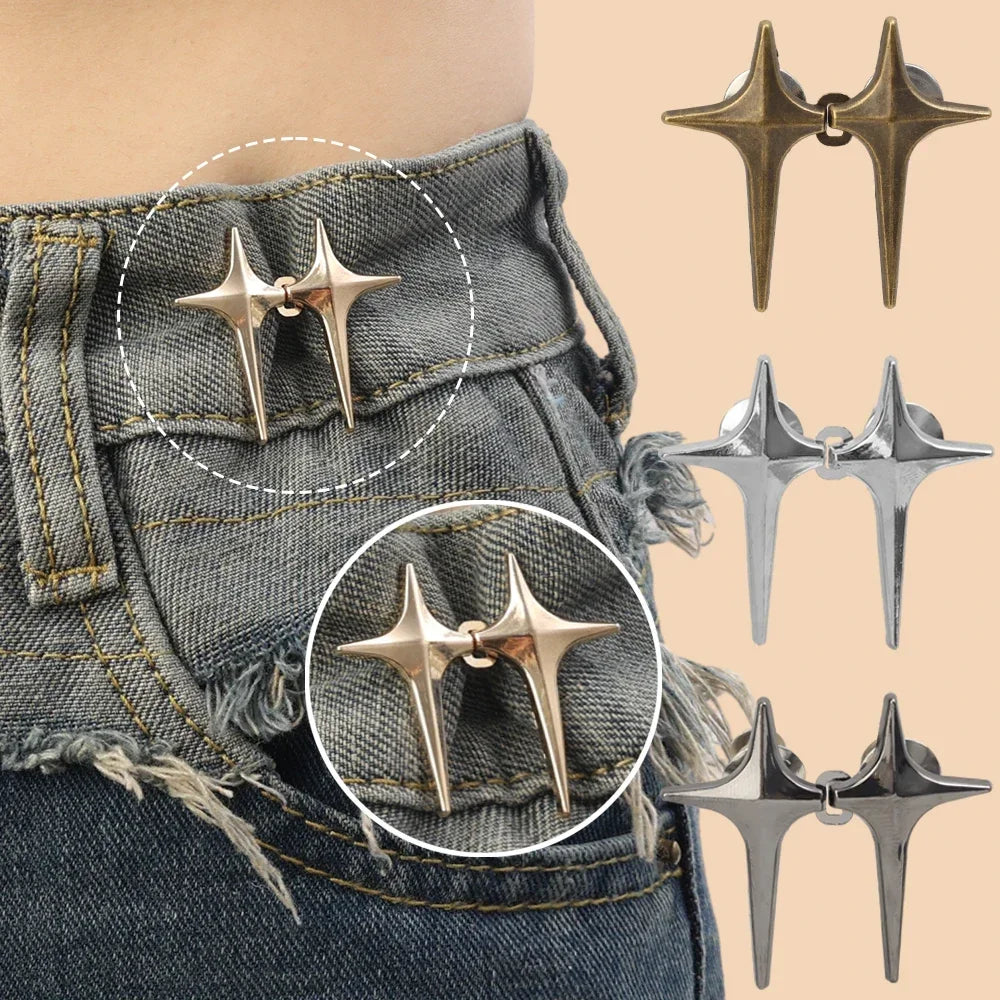 Silver and gold Y2K star-shaped clips used to tighten jeans at the waist.