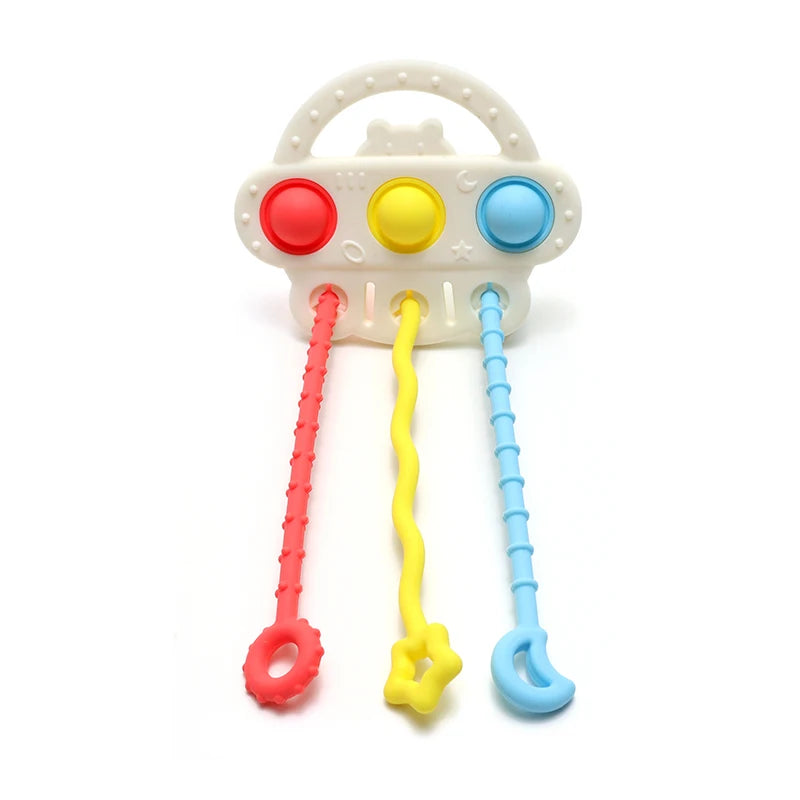 White silicone bear teether with colored pull strings for baby
