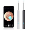 A pair of replacement ear spoon tips for a smart visual ear cleaner, shown next to a smartphone screen.