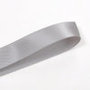 A roll of silver satin ribbon, approximately 25 yards long and wide, shown diagonally.