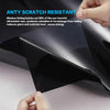 A hand is holding a piece of black ceramic privacy window tint film, demonstrating its anti-scratch resistance.