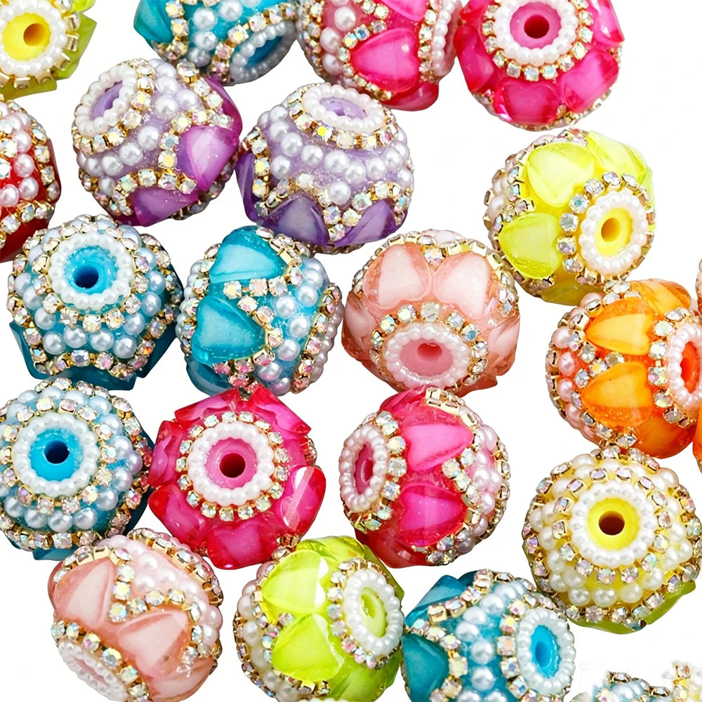 A collection of colorful rhinestone round beads used for jewelry making.