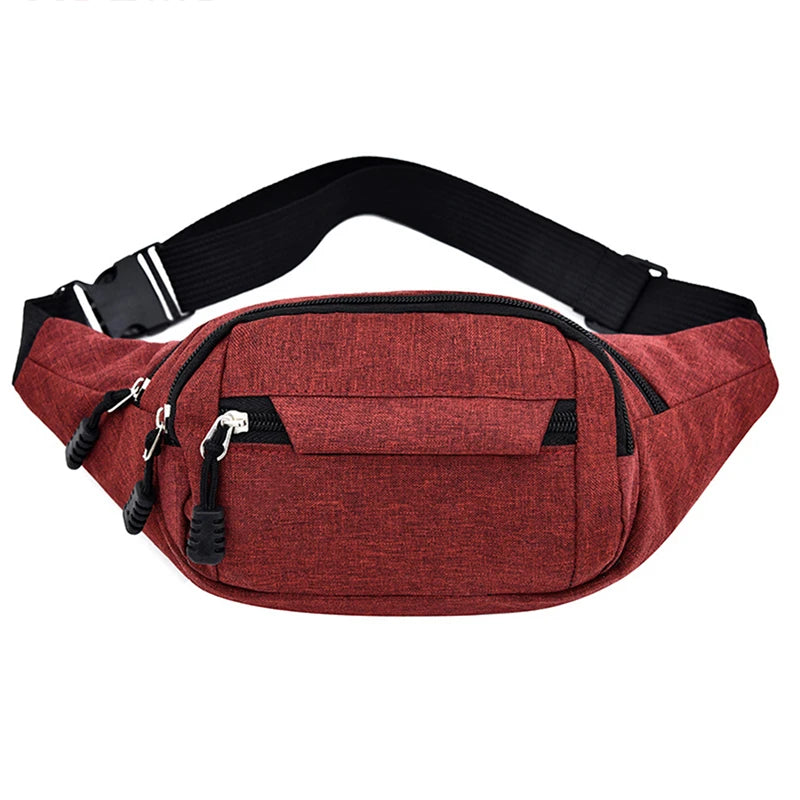 A maroon canvas waist pack with black adjustable straps and multiple pockets.