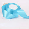 A roll of light blue satin ribbon for gift wrapping and crafts.