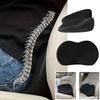 A black memory foam car seat cushion with a textured spine is shown being installed in a vehicle seat.