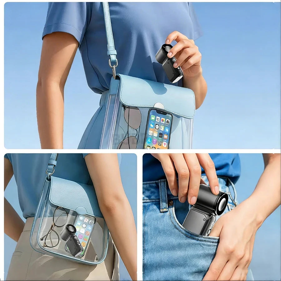 Nahaufnahme eines tragbaren Mini-Handheld-Ventilators mit LED-Anzeige, gehalten von einer Person.