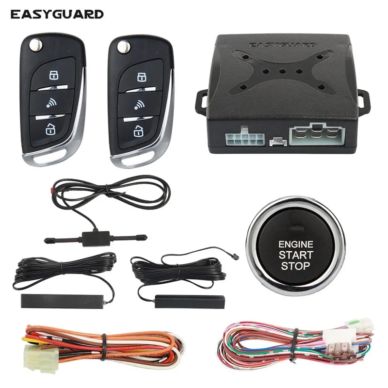A set of keyless entry components including a remote, an ignition module, and various wiring harnesses for a PKE system.