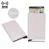A silver RFID wallet featuring a slim metal design and pop-up card holder for protection.